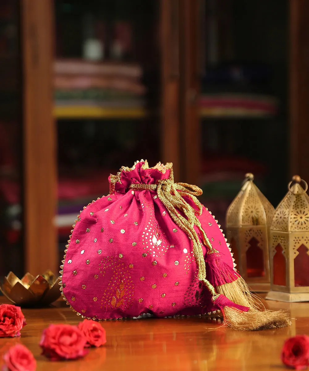 Magenta Pink Raw Silk Potli With Mukaish Hand Embroidery And Paisley Design