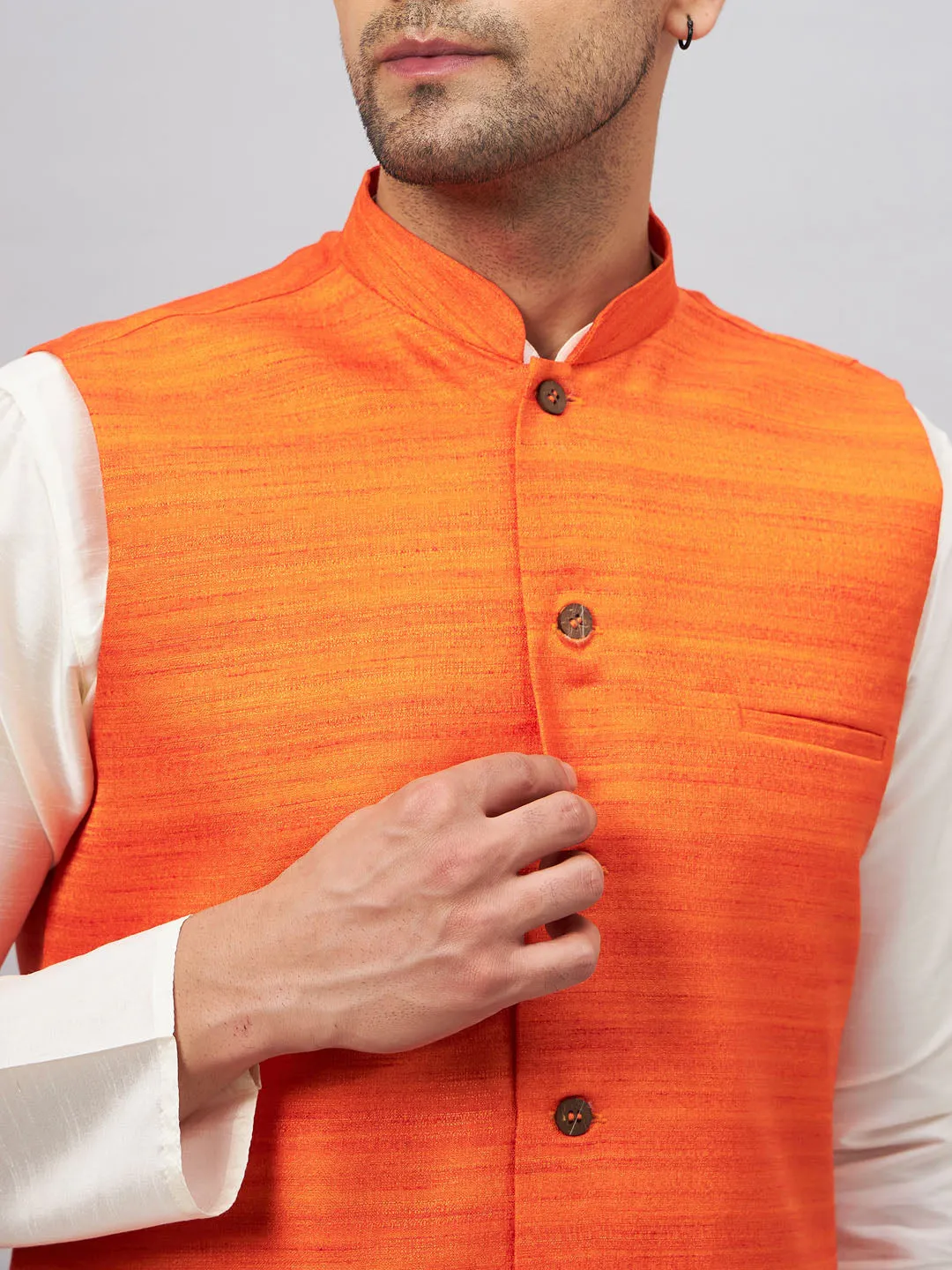 VM BY VASTRAMAY Men's Orange Matka Silk Nehru Jacket With Cream Silk Blend Kurta Pyjama Set