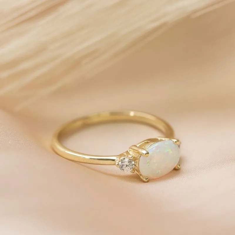 White Opal gold ring and two white zircon