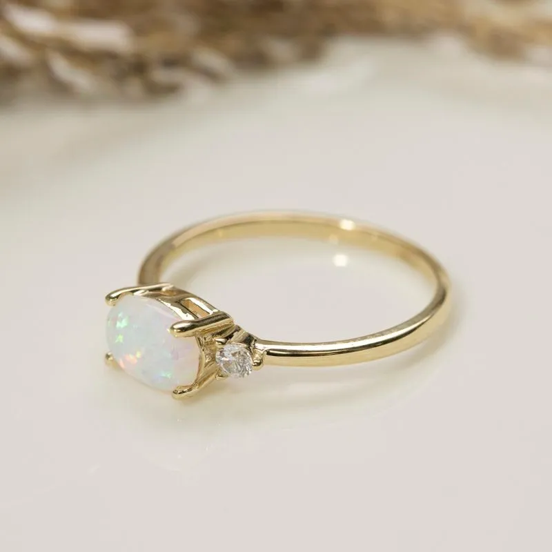 White Opal gold ring and two white zircon